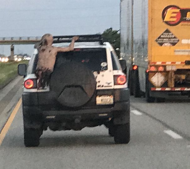 This Half-Zombie Clinging To The Back Of The Car In Front Of Me In Traffic This Half-Zombie Clinging To The Back Of The Car In Front Of Me In Traffic