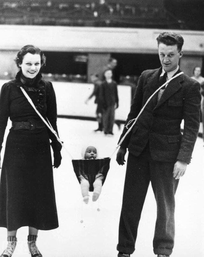A Couple Ice Skating With Their Baby, 1937 A Couple Ice Skating With Their Baby, 1937