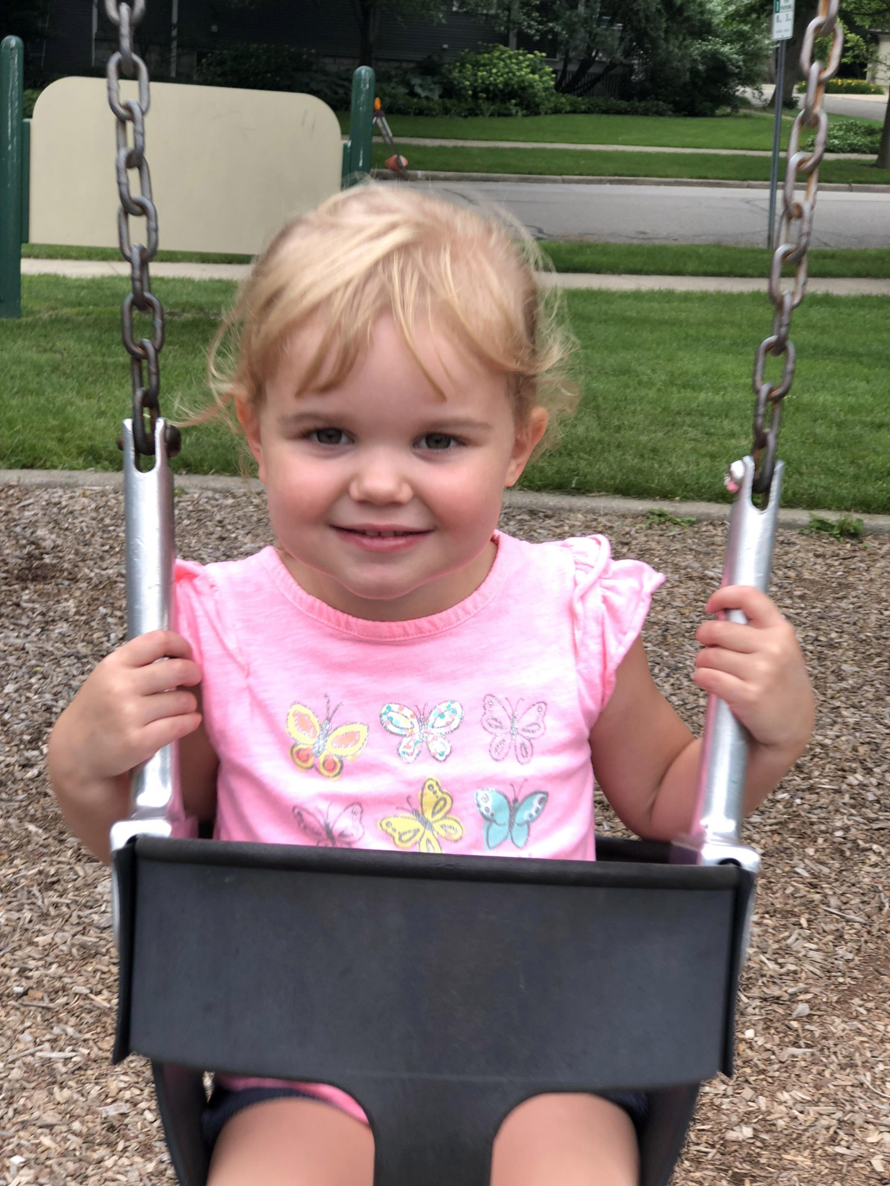 The toddler began suffering seizures and would scream and claw at her own skin