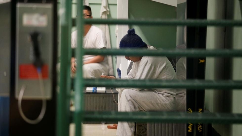 (File photo) Detainees sit on their bunks in a housing unit during a media tour at Northwest ICE Processing Center, one of 31 dedicated ICE facilities that house immigration detainees, in Tacoma, Washington, U.S. December 16, 2019.