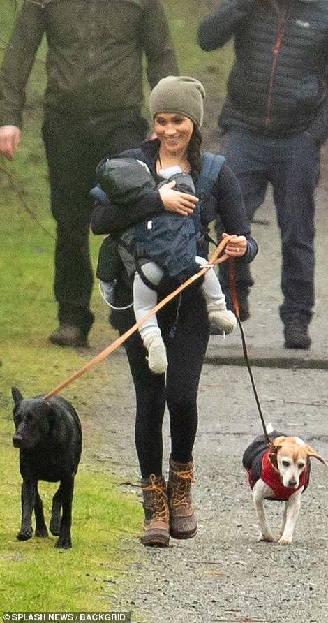 Two Royal Protection Officers strolled behind her at a discreet distance