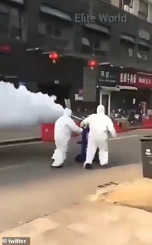 Two people were also seen pushing the substance along an empty street