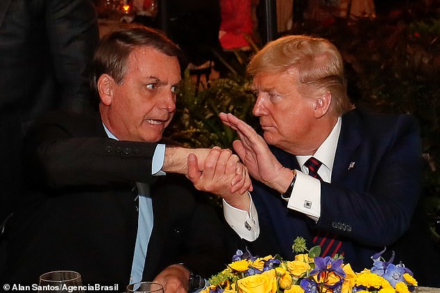 President Donald Trump will learn on Friday whether Brazilian President Jair Bolsonaro has tested positive for the coronavirus; the two men shook hands during a dinner at Mar-a-Lago on Saturday night
