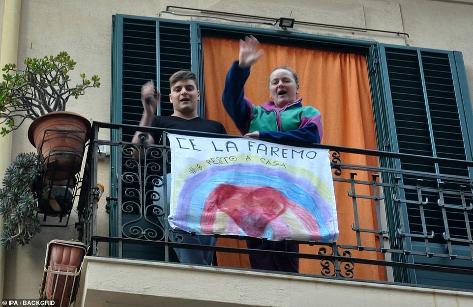 People singing from their balcony in Palermo during the lockdown in Italy, which is starting to show signs of bearing fruit