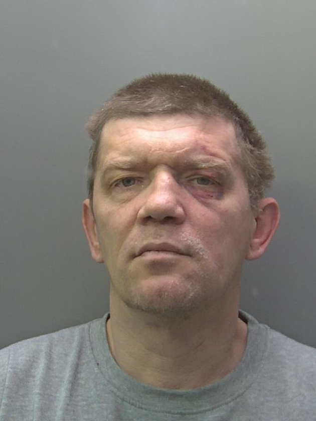 Andriejus Kostiajevas (pictured) has been jailed for a minimum of 28 years after killing his wife Ligita Kostiajeviene and stabbing a child nine times. Picture: Supplied/CambsCops