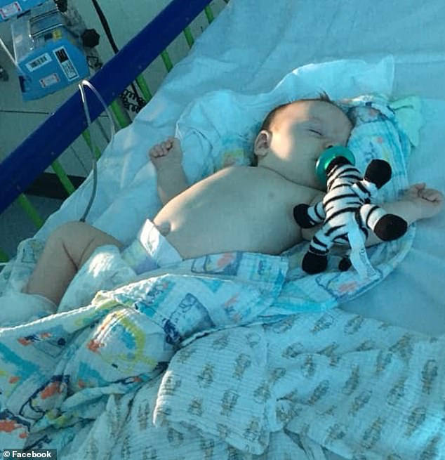 Ares Banister (pictured) has tested positive for the deadly virus and is currently in hospital at Leicester Royal Infirmary, his mother Jodie Banister said in a post on Facebook