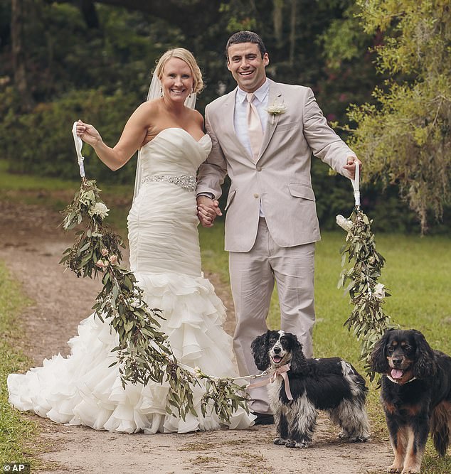 Looking back: The two nurses married five years ago, and Cayer said the image of them working at the hospital has struck a chord because 