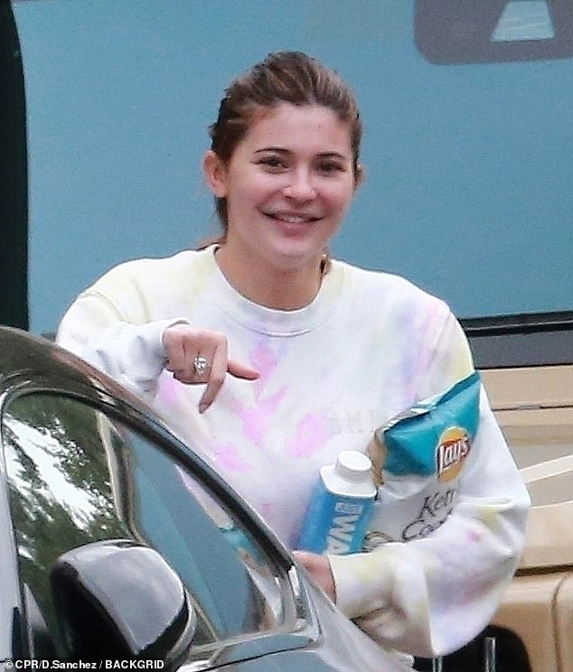 Quite the difference: Kylie recently stunned fans with her make-up free appearance earlier this month, as well getting criticism for moving between homes during lockdown