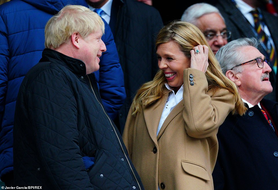 Mr Johnson and Miss Symonds at the England v Wales rugby match at Twickenham on March 7, just before Mr Johnson contracted coronavirus