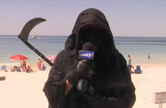 Lawyer dresses as Grim Reaper to protest reopening of Florida ...
