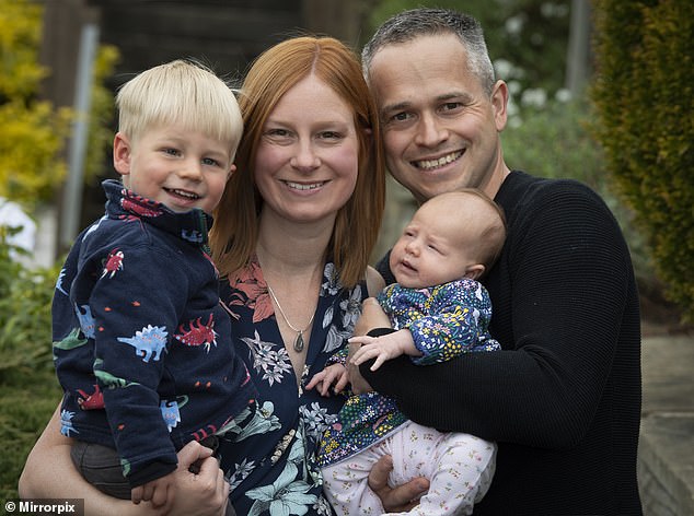 Jen and Will Cartwright with their children Noah and newborn Holly who they showed to Will
