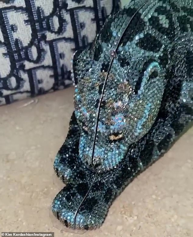 Shades of blue: Shortly after, Kim, 39, posted a video of her own matching cheetah clutch in blue, telling Kylie, 22: 