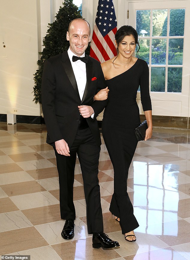 Katie Miller (right) is the wife of top Trump adviser Stephen Miller (left). The couple is seen above in September 2019
