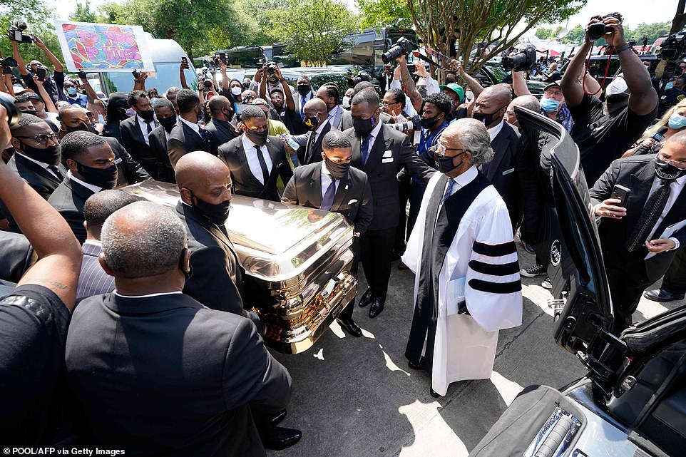 Rev. Al Sharpton looked on as pallbearers hauled Floyd