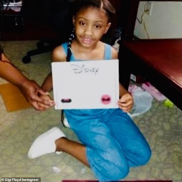 Stockholder: The daughter of the Minneapolis security guard displayed her certificate