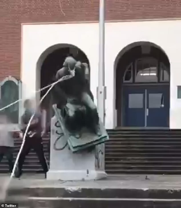 The unidentified group used a rope and what appeared to be a hammer to loosen the statue