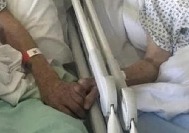 The couple had been in separate wards but were moved together and held hands before their deaths