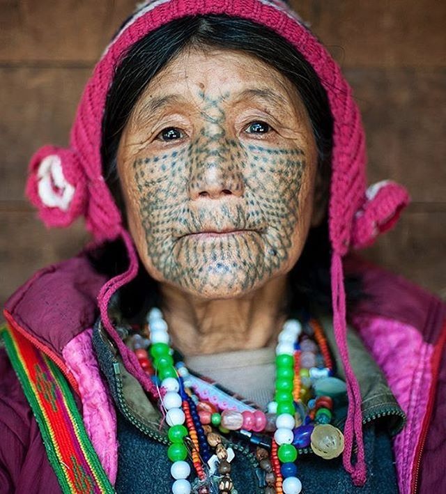 tattooed face woman