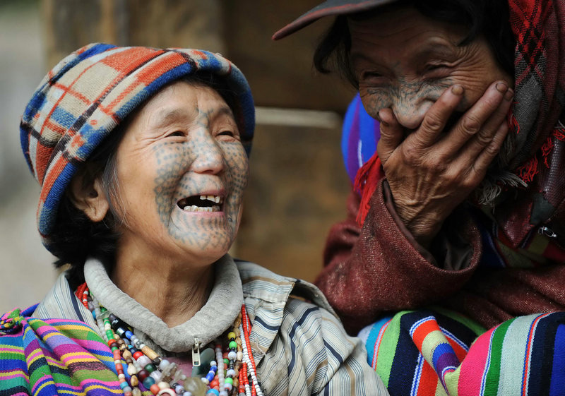 tattooed face woman