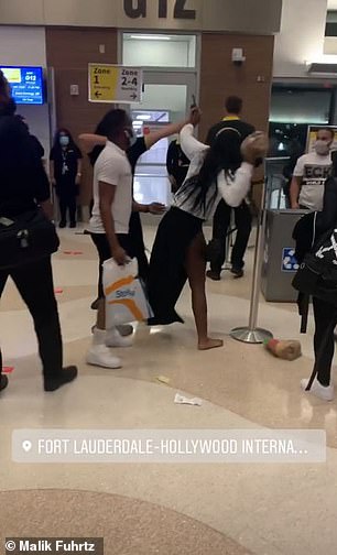 Video shows them throwing objects 