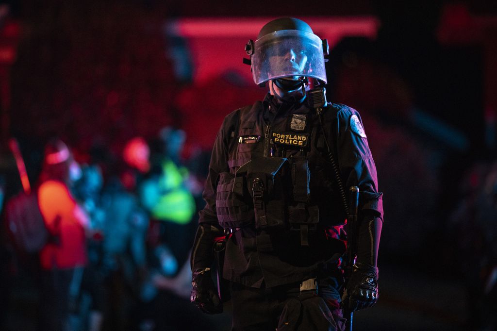 Portland cops hurt by 10-pound rock thrown by protestors