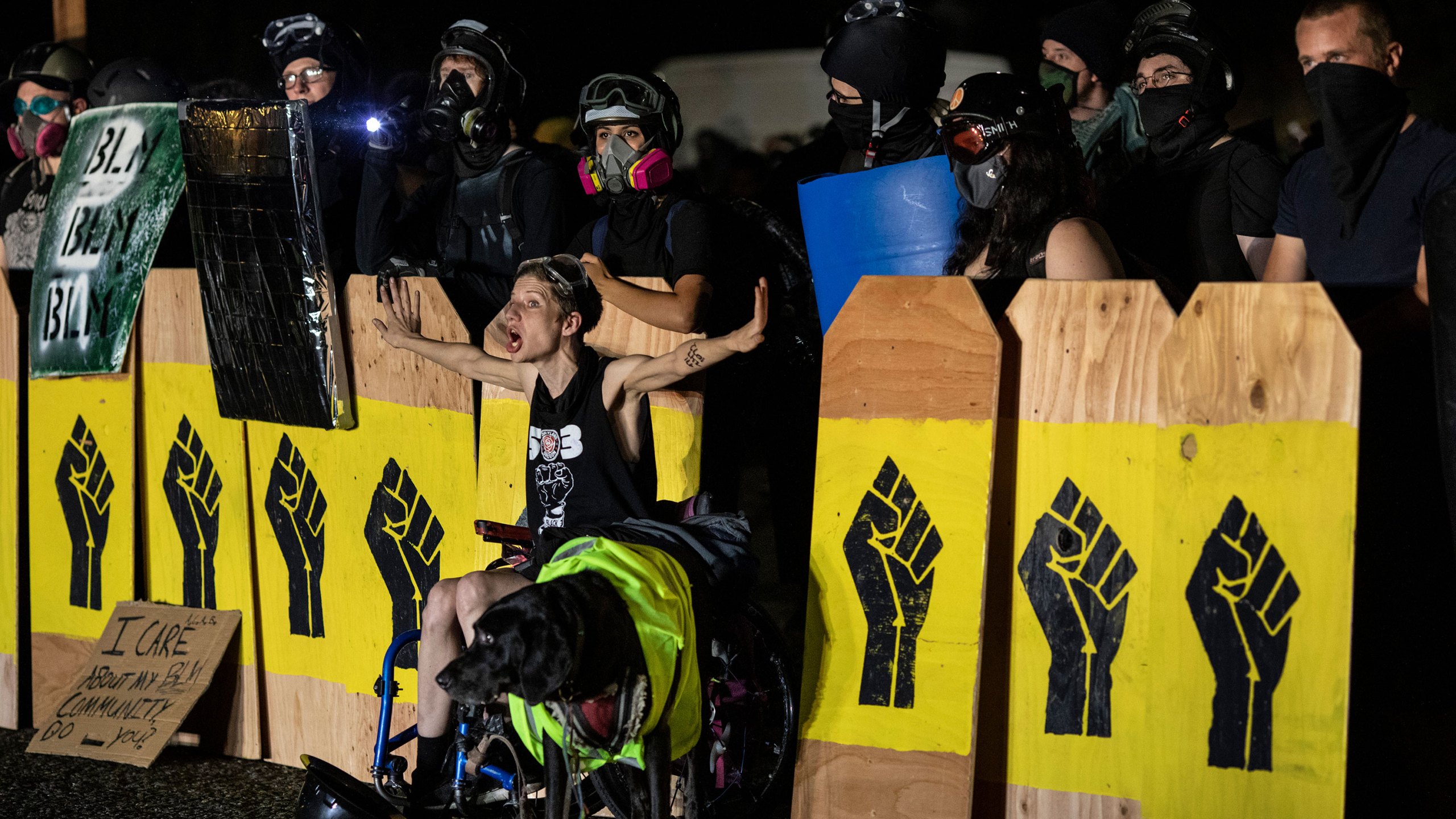 Portland officers injured after protester throws a nearly 10-pound ...
