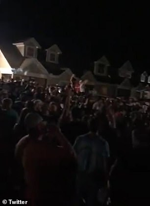 Hundreds of Georgia university students have been seen partying without masks and failing to social distance ahead of the school