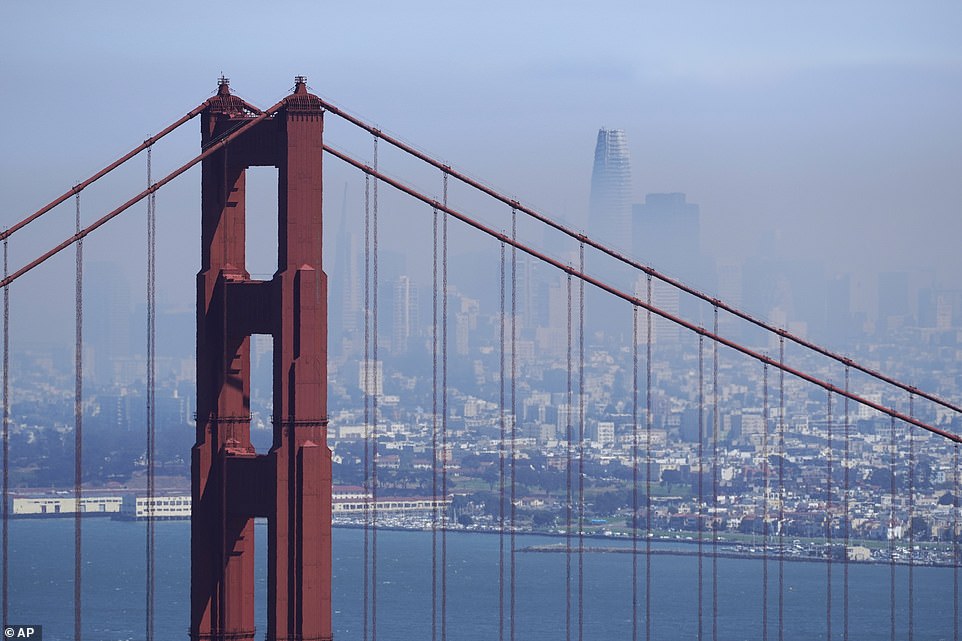 The San Francisco skyline is obscured by smoke from wildfires Thursday as the state