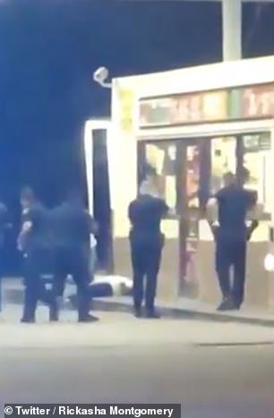 As the man came within feet of the door to the occupied convenience mart, police opened fire, shooting 11 times