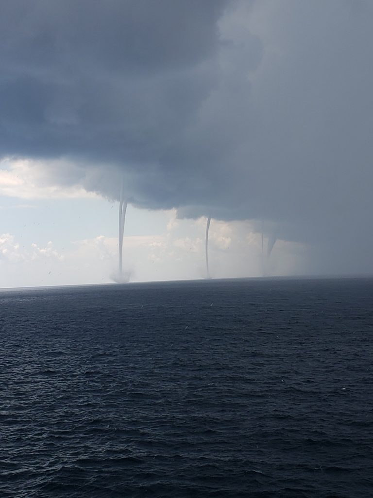 Footage Showing Six Massive Swirling Waterspouts Captured Off The