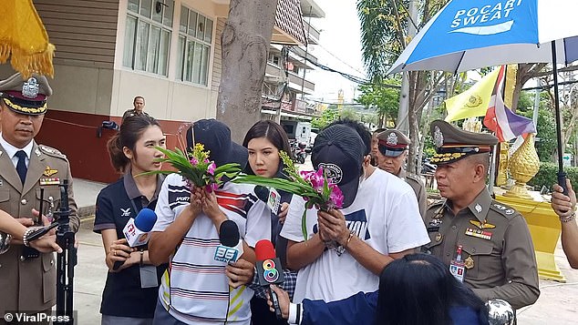 Aom and her boyfriend Jay, 23, pictured wearing white and hiding their faces with flowers and hats, were both arrested. The mother admitted murdering her daughter when she