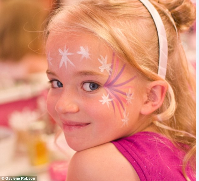 The young girl required immediate surgery to remove the cancerous growth, which was dangerously close to her brain (pictured after surgery)