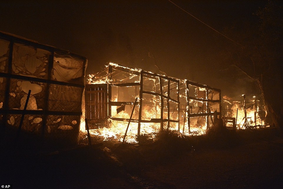 Fire rips through makeshift tents at the Moria camp on the Greek island of Lesbos, as police launch an arson investigation