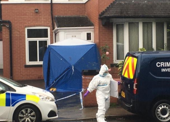 Forensic officers examined the scene