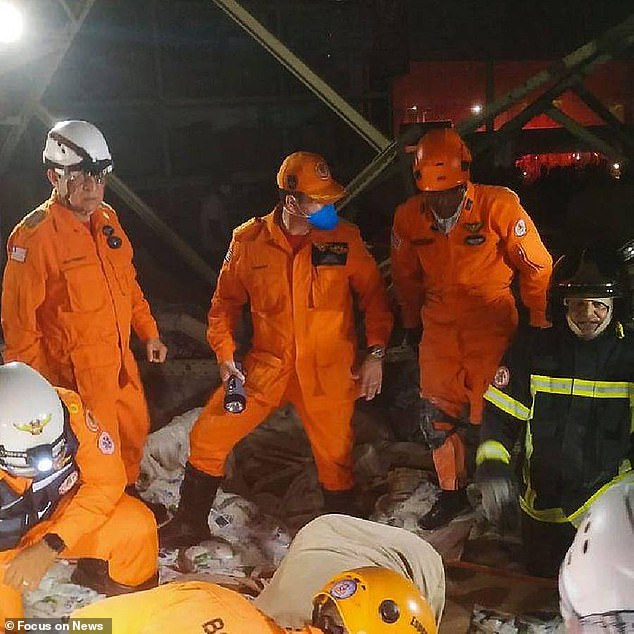 Emergency workers searching to find people trapped