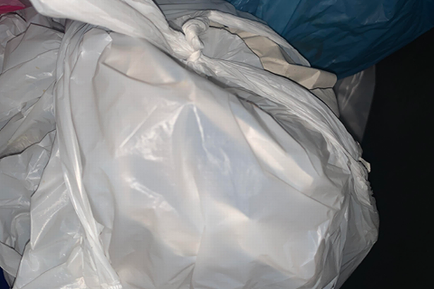 The woman chucked the takeaway in the bin