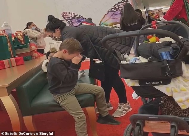 Santa tells crying boy he won