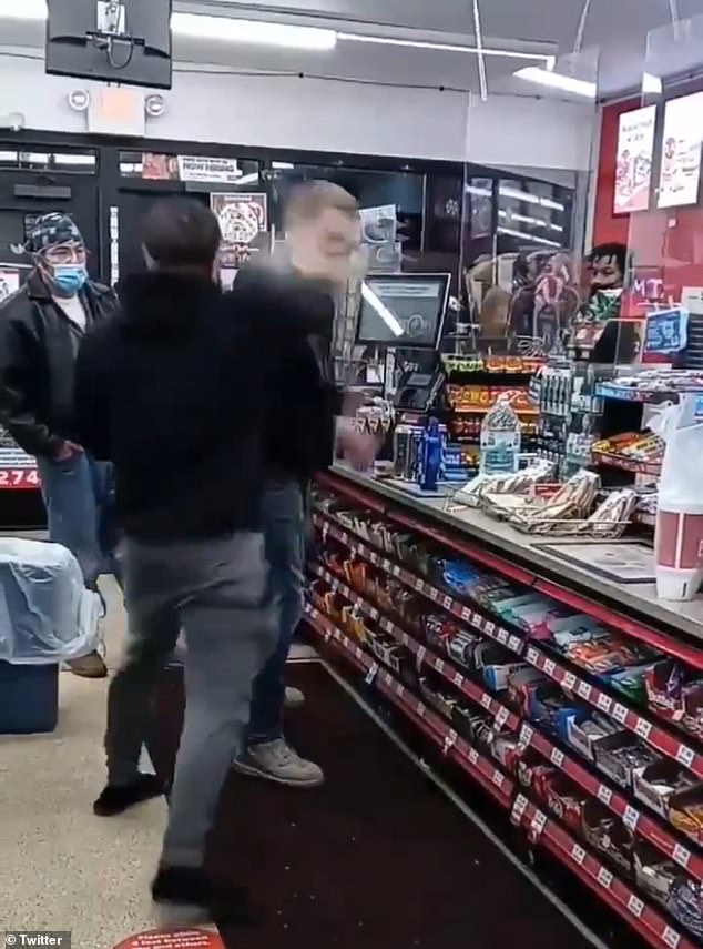 Man slams a can of Twisted Tea into a racists head it bursts after he uses the  N-word argument | Daily Mail Online