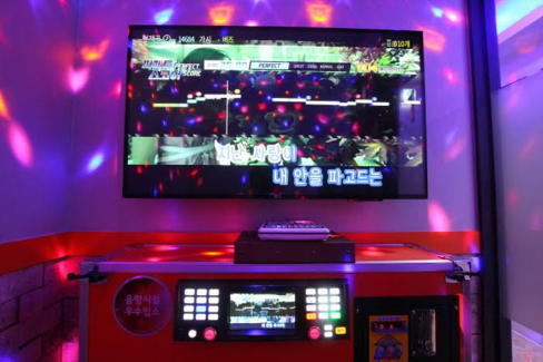 TJ미디어, 동전노래방에 