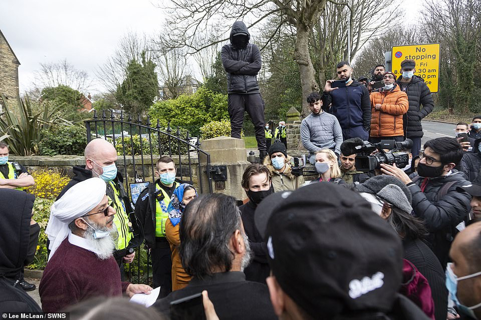 Mufti Mohammed Amin Pandor speaks to the crowd of parents who gathered to protest outside Batley Grammar School today