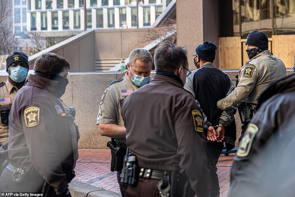 Derek Chauvin returns to court for jury selection in the George Floyd trial amid protests | Daily Mail Online