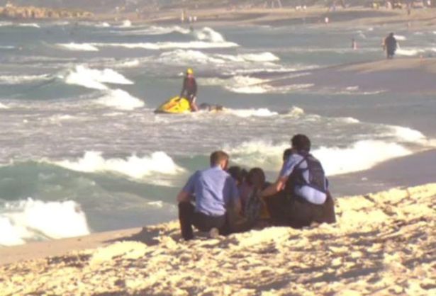 Relatives and friends of the teenager at Scarborough Beach