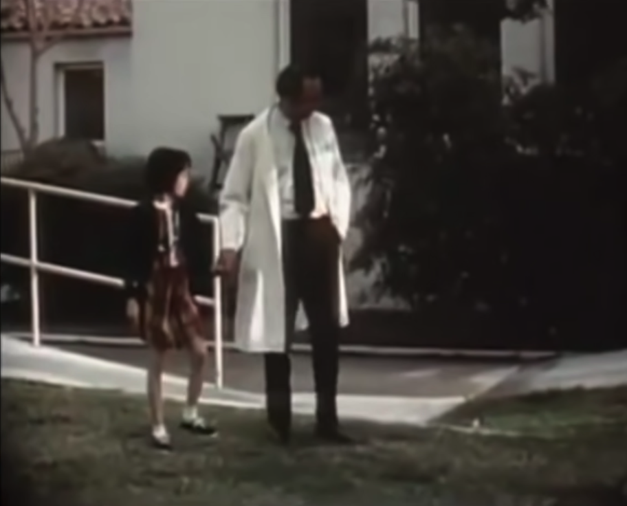 Genie with her psychologist after she was rescued from her father