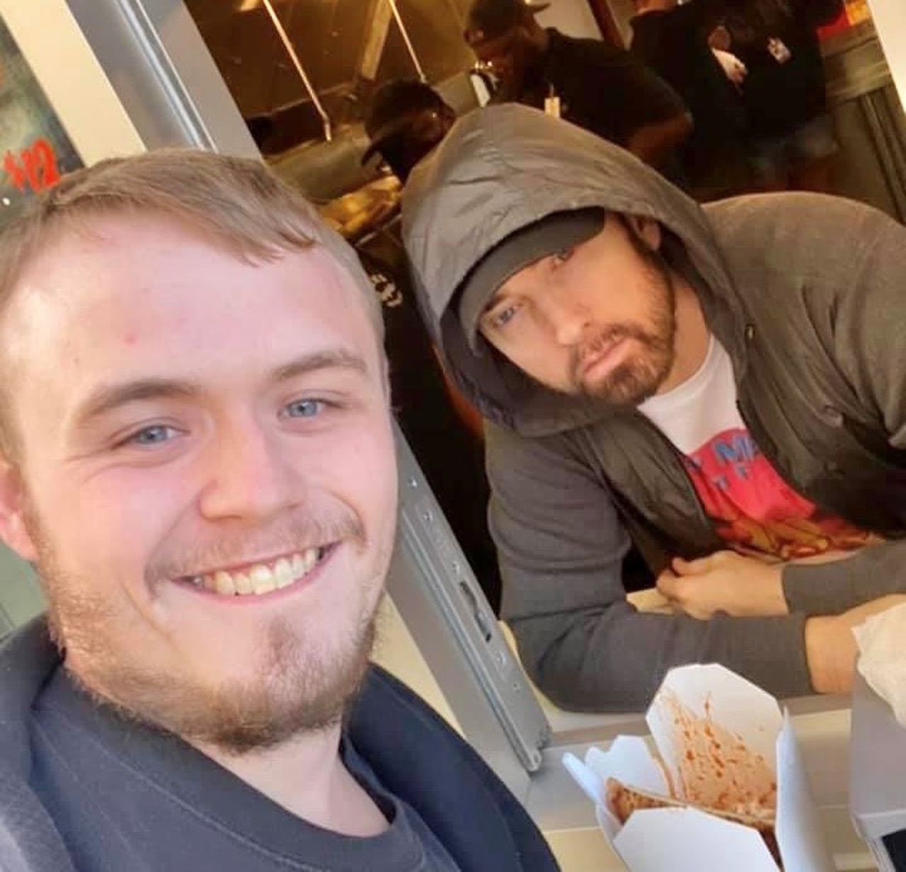 Surprise! Eminem serves fans at food window of Mom's Spaghetti restaurant Detroit opening - mlive.com