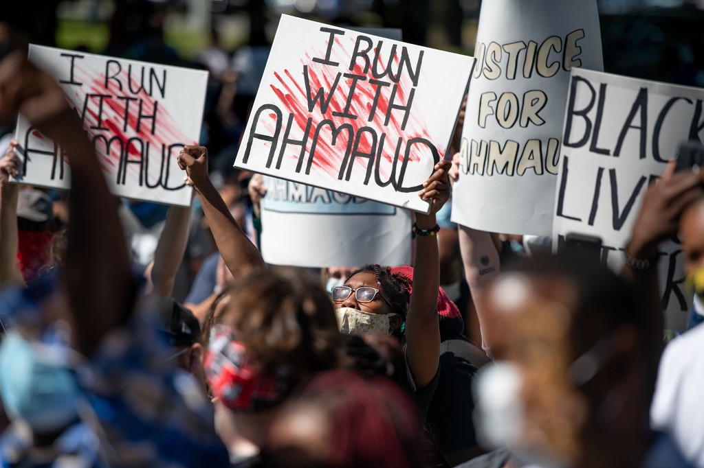 Demonstrators protest the shooting death of Ahmaud Arbery, another black man who was murdered in 2020, at the Glynn County Courthouse.