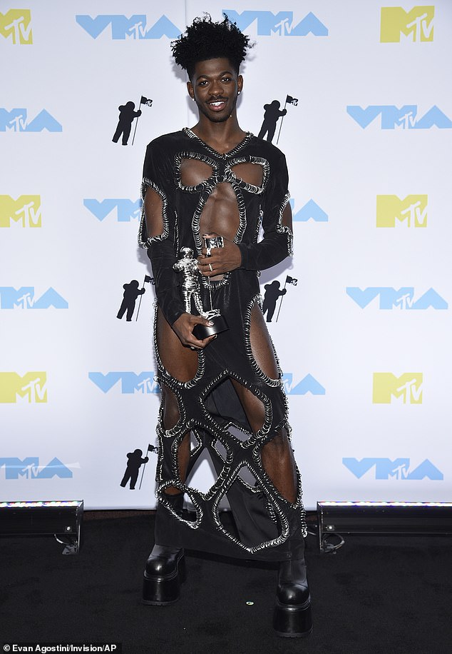 Exclusive Lil Nas X Gets Fashionably Dramatic While Baring Chiseled Chest In Startling