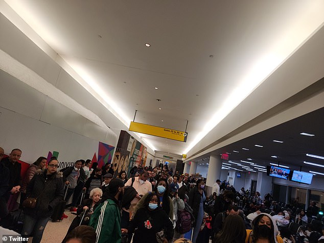 Passengers are returned to the terminal after a JetBlue flight bumped into another plane on the tarmac