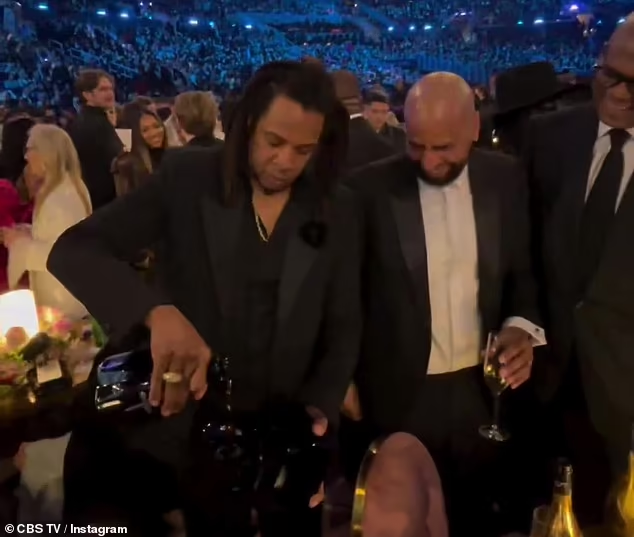 'Disrespectful' Jay-Z Caught Drinking Cognac Out Of His Grammy After ...