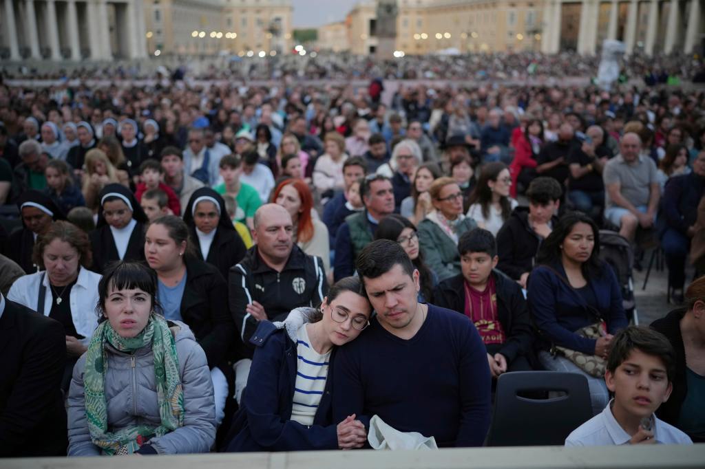 Faithful gather for a rosary prayer for the late Pope Francis, in St. Peter