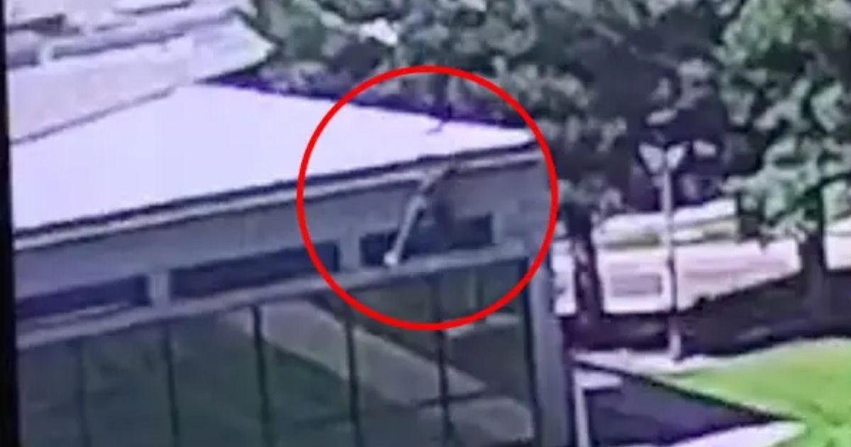 copy of articles thumbnail 1200 x 630 2025 09 12t134258 433.jpg - Shocking new video shows assassin leaping from rooftop and fleeing in seconds after shooting as authorities admit they have NO IDEA who and where suspect is